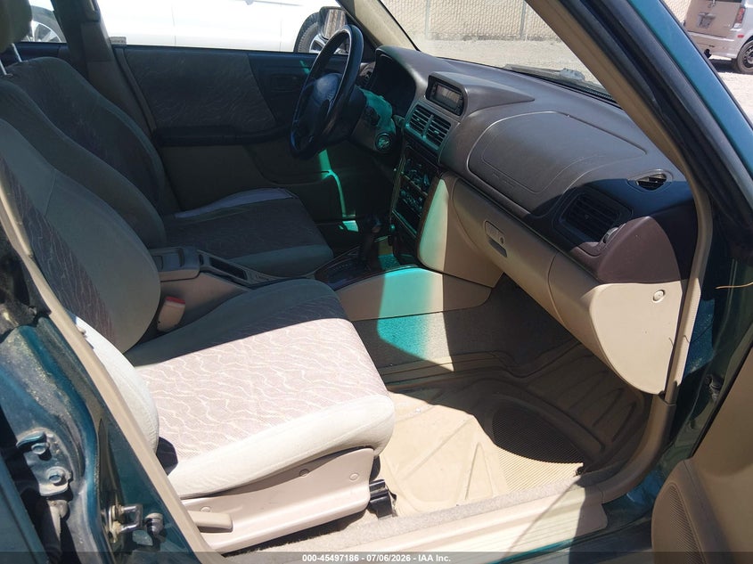 1998 Subaru Forester VIN JF1SF6359WH710922 IAAI salvage auction — NORMAL WEAR, Regular (Nevada), sold $25 on 2026-07-17 (photo 5)