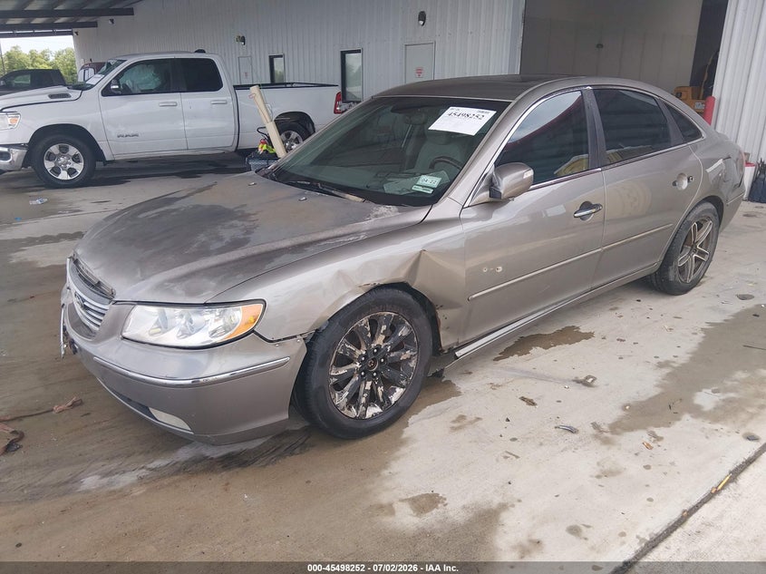 2009 Hyundai Azera VIN KMHFC46F89A388165 IAAI salvage auction — NORMAL WEAR, Original (Texas), sold $50 on 2026-07-17 (photo 2)