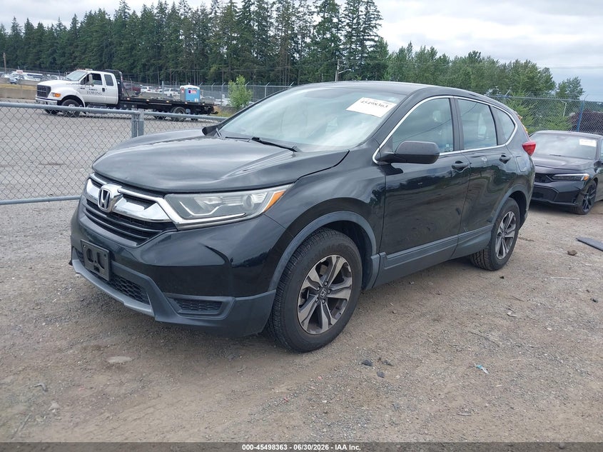 2017 Honda Cr-v VIN 7FARW5H39HE007726 IAAI salvage auction — SIDE, Salvage Title, sold $4,325 on 2026-07-22 (photo 2)