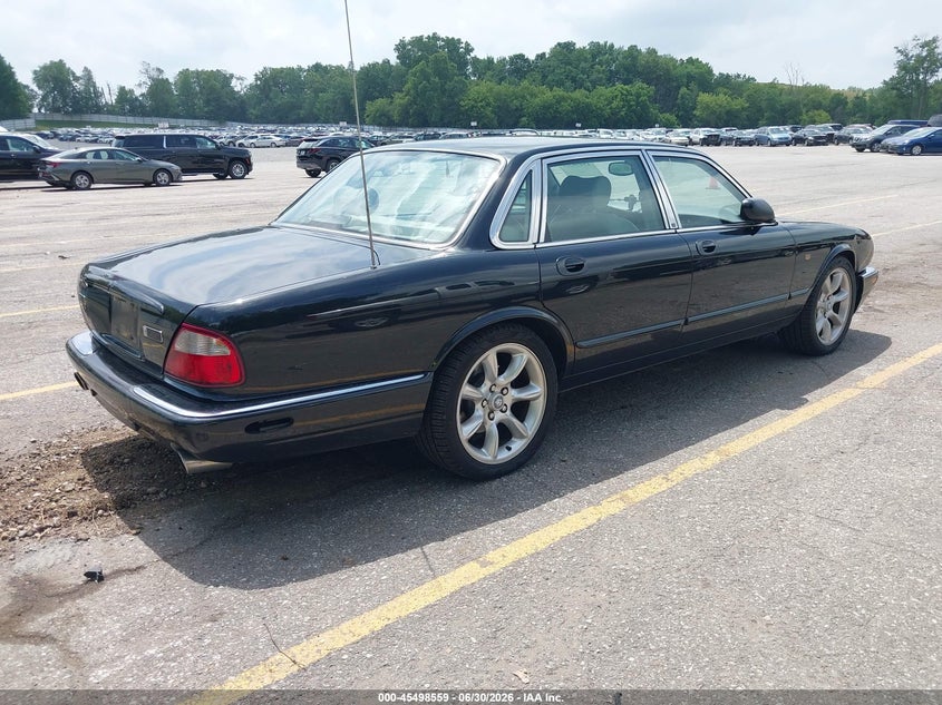 2001 Jaguar Xj series VIN SAJDA15B41MF34888 IAAI salvage auction — NORMAL WEAR, Clear (Michigan), sold $625 on 2026-07-06 (photo 4)