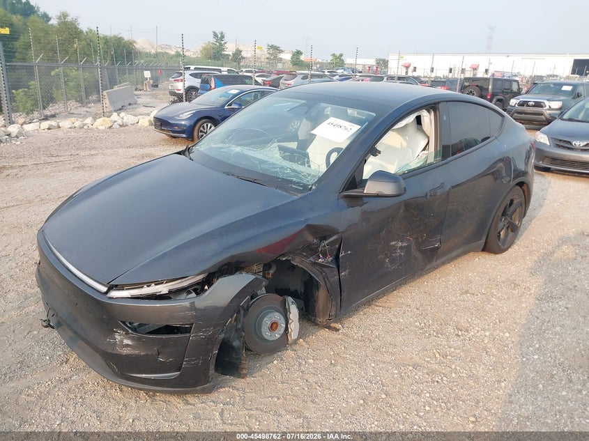 2026 Tesla Model y VIN 7SAYGDED6TF420260 IAAI salvage auction — SIDE, Salvage Title, sold $16,000 on 2026-09-02 (photo 2)
