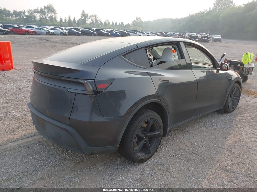 2026 Tesla Model y VIN 7SAYGDED6TF420260 IAAI salvage auction — SIDE, Salvage Title, sold $16,000 on 2026-09-02 (photo 4)