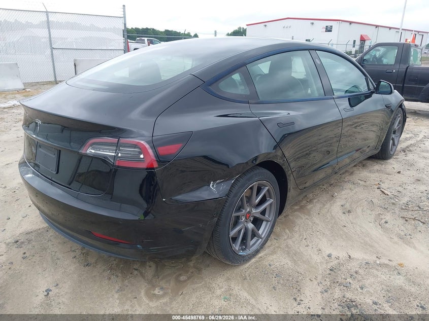 2021 Tesla Model 3 VIN 5YJ3E1EA0MF085984 IAAI salvage auction — RIGHT FRONT, Salvage (North Carolina), sold $9,000 on 2026-07-25 (photo 4)