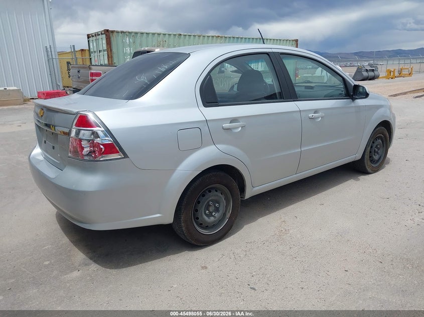 2011 Chevrolet Aveo VIN KL1TD5DE7BB137018 IAAI salvage auction — NORMAL WEAR, Rebuilt/Restored (Utah), sold $150 on 2026-07-29 (photo 4)