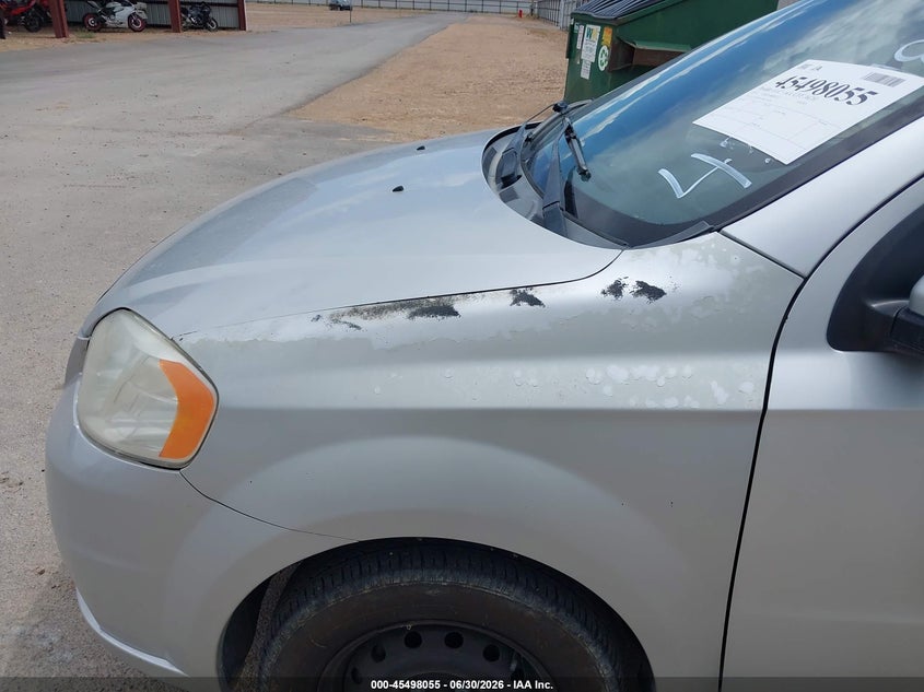 2011 Chevrolet Aveo VIN KL1TD5DE7BB137018 IAAI salvage auction — NORMAL WEAR, Rebuilt/Restored (Utah), sold $150 on 2026-07-29 (photo 6)