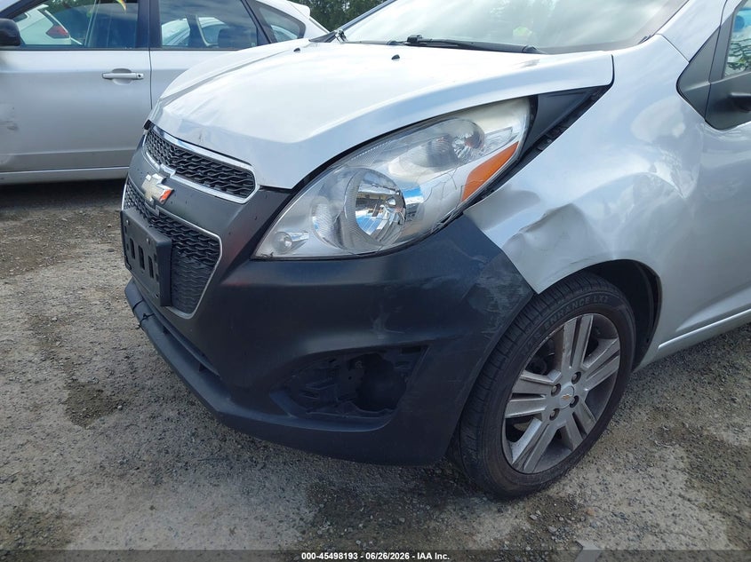2015 Chevrolet Spark VIN KL8CD6S94FC720644 IAAI salvage auction — NORMAL WEAR, Rebuilt-Non-Public (Washington), sold $375 on 2026-07-29 (photo 6)