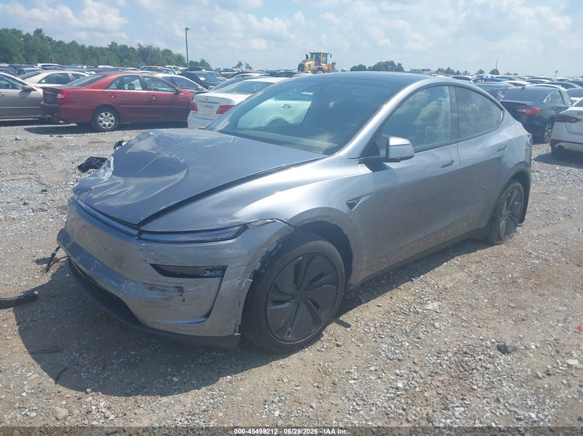 2026 Tesla Model y VIN 7SAYGDED9TF433133 IAAI salvage auction — RIGHT FRONT, Salvage Title, sold $19,950 on 2026-08-27 (photo 2)