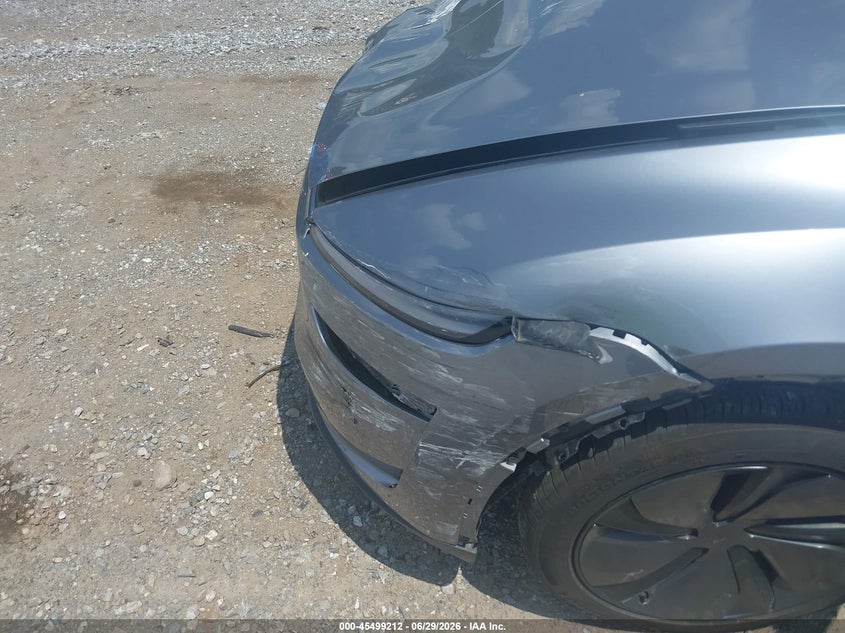 2026 Tesla Model y VIN 7SAYGDED9TF433133 IAAI salvage auction — RIGHT FRONT, Salvage Title, sold $19,950 on 2026-08-27 (photo 6)
