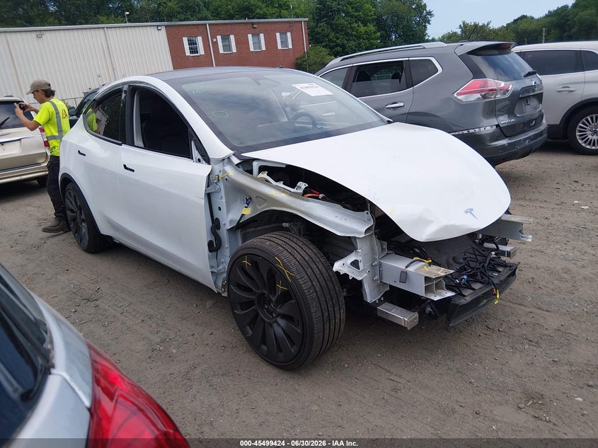 2025 Tesla Model y VIN 7SAYGDEF7SF310110 IAAI salvage auction — FRONT END, Salvage (Rhode Island), sold $12,600 on 2026-08-02 (photo 1)