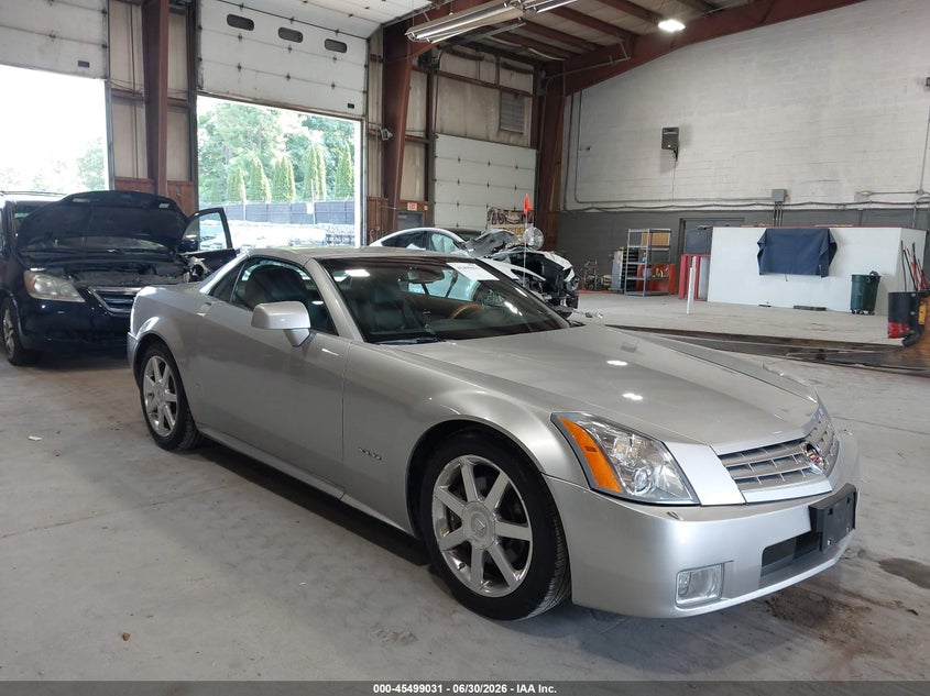 2006 Cadillac Xlr VIN 1G6YV36A565601649 IAAI salvage auction — LEFT FRONT, Clear (New York), sold $8,250 on 2026-07-08 (photo 1)