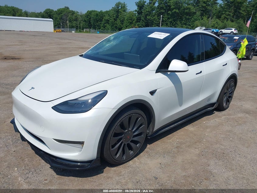 2022 Tesla Model y VIN 7SAYGDEF1NF468186 IAAI salvage auction — SIDE, Wait Title, sold $13,100 on 2026-09-05 (photo 2)