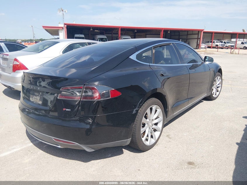 2013 Tesla Model s VIN 5YJSA1DP8DFP07633 IAAI salvage auction — NORMAL WEAR, Original (Texas), sold $2,150 on 2026-07-20 (photo 4)