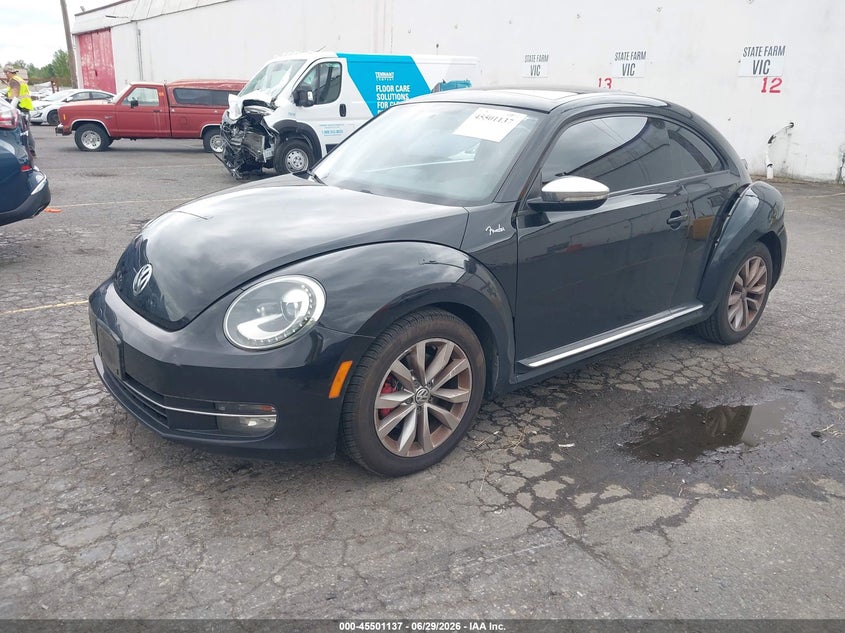 2013 Volkswagen Beetle VIN 3VWVT7AT6DM680713 IAAI salvage auction — LEFT REAR, Salvage (Oregon), sold $1,750 on 2026-09-11 (photo 2)