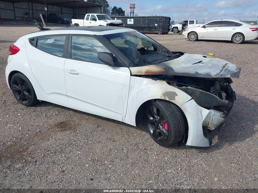 2015 Hyundai Veloster VIN KMHTC6AD8FU244713 IAAI salvage auction — ENGINE BURN, Salvage Title, sold $250 on 2026-07-13 (photo 1)
