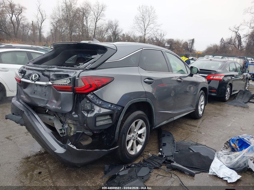 2017 Lexus Rx VIN 2T2BZMCAXHC107516 IAAI salvage auction — REAR END, Salvage Title, sold $8,100 on 2026-09-10 (photo 4)