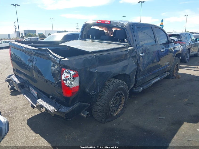 2017 Toyota Tundra VIN 5TFEM5F12HX117296 IAAI salvage auction — ROLLOVER, Salvage Title, sold $4,950 on 2026-07-10 (photo 4)