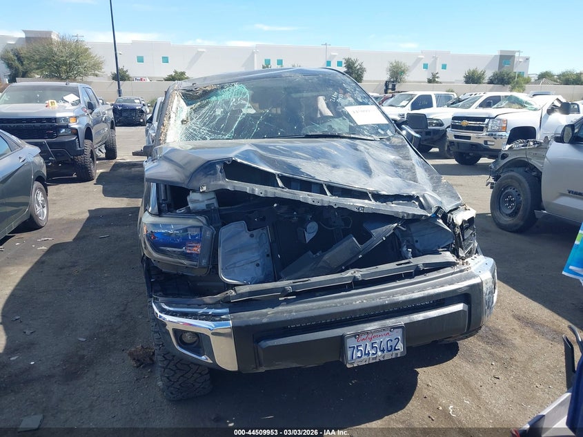 2017 Toyota Tundra VIN 5TFEM5F12HX117296 IAAI salvage auction — ROLLOVER, Salvage Title, sold $4,950 on 2026-07-10 (photo 6)