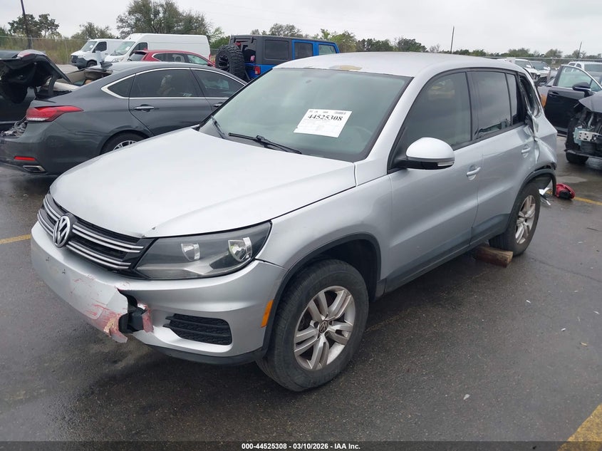 2014 Volkswagen Tiguan VIN WVGAV3AX2EW579009 IAAI salvage auction — FRONT & REAR, Salvage (Texas), sold $275 on 2026-07-16 (photo 2)