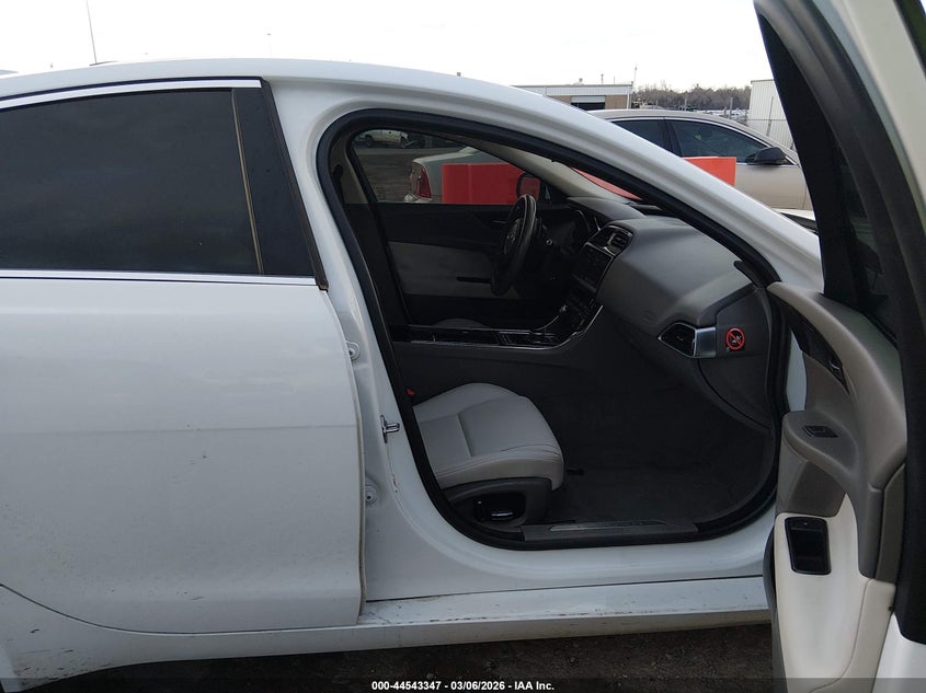 2019 Jaguar Xe VIN SAJAR4FX9KCP47542 IAAI salvage auction — LEFT SIDE, Clear (Oklahoma), sold $2,200 on 2026-07-15 (photo 5)