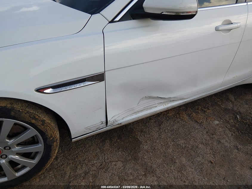 2019 Jaguar Xe VIN SAJAR4FX9KCP47542 IAAI salvage auction — LEFT SIDE, Clear (Oklahoma), sold $2,200 on 2026-07-15 (photo 6)