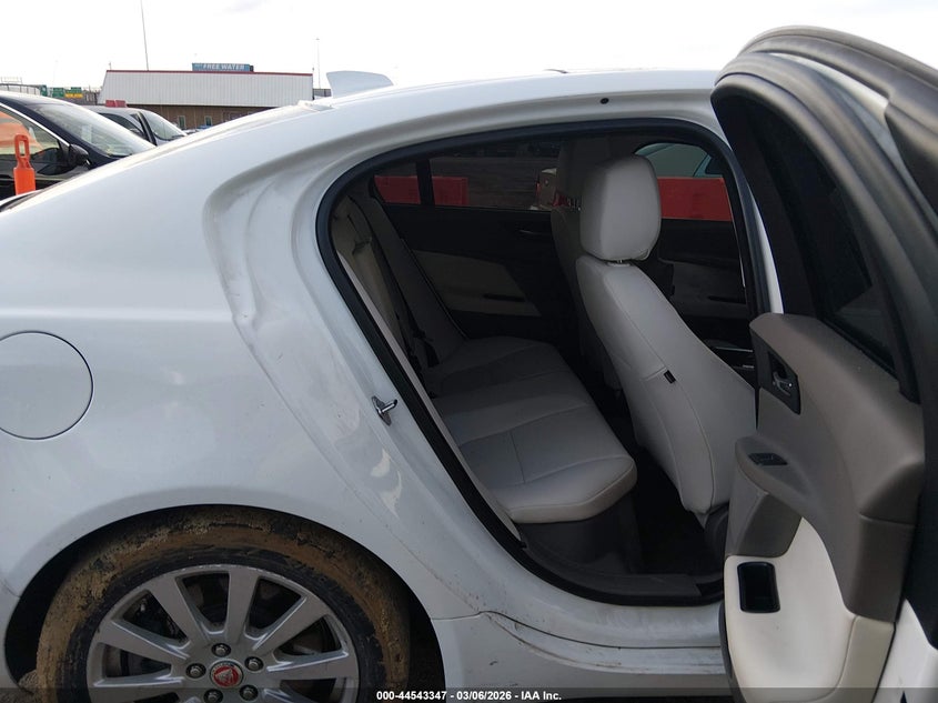 2019 Jaguar Xe VIN SAJAR4FX9KCP47542 IAAI salvage auction — LEFT SIDE, Clear (Oklahoma), sold $2,200 on 2026-07-15 (photo 8)