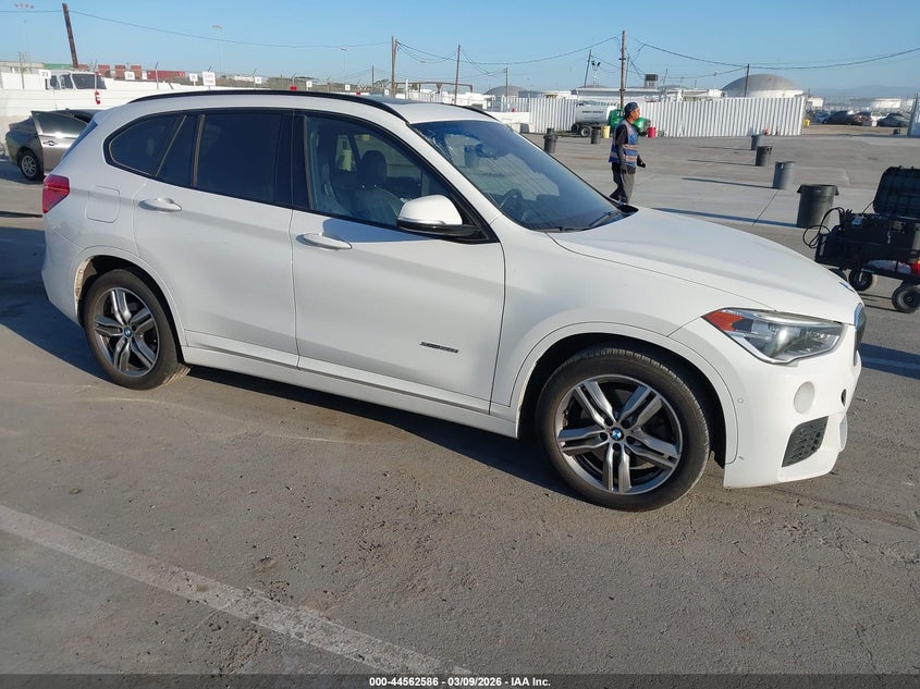 2016 BMW X1 VIN WBXHT3C30GP888075 IAAI salvage auction — LEFT FRONT, Salvage Title, sold $75 on 2026-07-22 (photo 1)