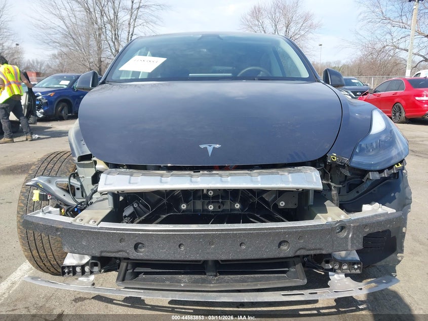 2024 Tesla Model y VIN 7SAYGDEF0RF036131 IAAI salvage auction — FRONT & REAR, Salvage Title, sold $14,600 on 2026-07-16 (photo 6)