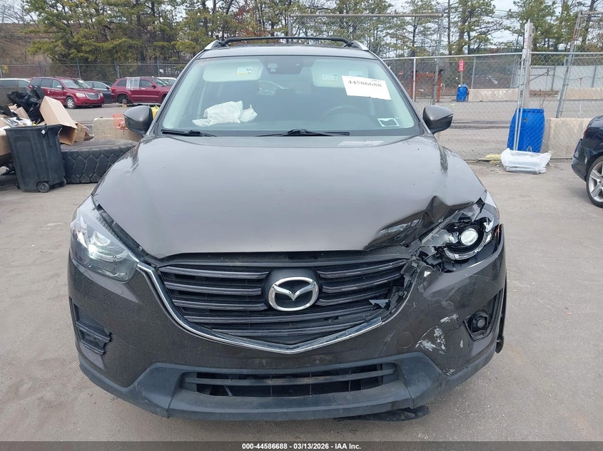 2016 Mazda Cx-5 VIN JM3KE4CY3G0630194 IAAI salvage auction — FRONT END, Mv-907A (New York), sold $2,100 on 2026-09-08 (photo 6)
