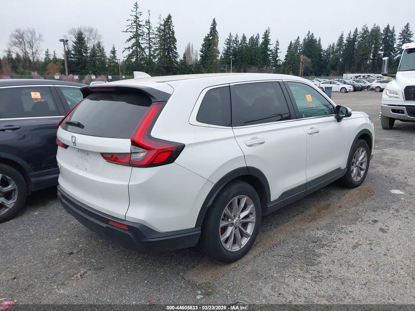 2023 Honda Cr-v VIN 2HKRS4H45PH437652 IAAI salvage auction — THEFT, Wait Title, sold $10,600 on 2026-07-29 (photo 4)