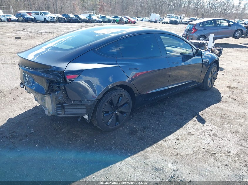 2025 Tesla Model 3 VIN 5YJ3E1EA1SF953388 IAAI salvage auction — FRONT & REAR, Salvage (Idaho), sold $9,200 on 2026-07-08 (photo 4)