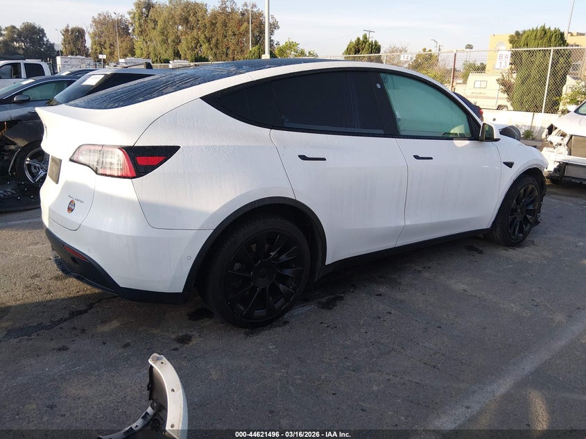 2022 Tesla Model y VIN 7SAYGDEE3NF386189 IAAI salvage auction — FRONT END, Salvage Title, sold $5,800 on 2026-07-09 (photo 4)
