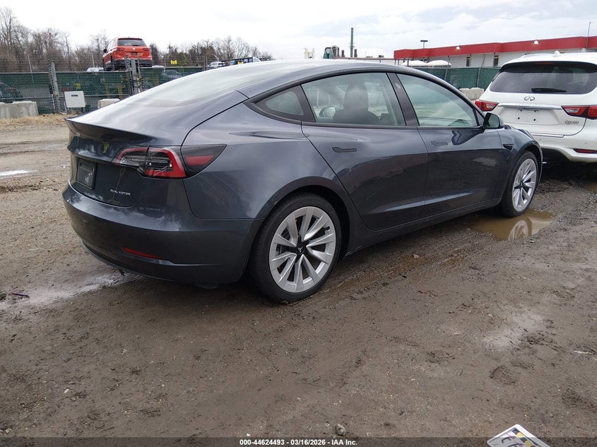 2022 Tesla Model 3 VIN 5YJ3E1EB4NF246654 IAAI salvage auction — SIDE, Salvage Title, sold $17,325 on 2026-07-16 (photo 4)