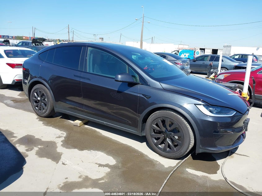 2025 Tesla Model x VIN 7SAXCBE59SF468273 IAAI salvage auction — RIGHT REAR, Salvage Title, sold $35,250 on 2026-07-29 (photo 1)