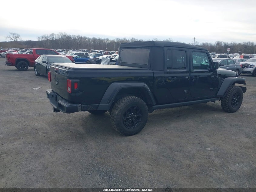 2023 Jeep Gladiator VIN 1C6HJTAG1PL525419 IAAI salvage auction — NORMAL WEAR, Salvage Title, sold $20,400 on 2026-08-31 (photo 4)