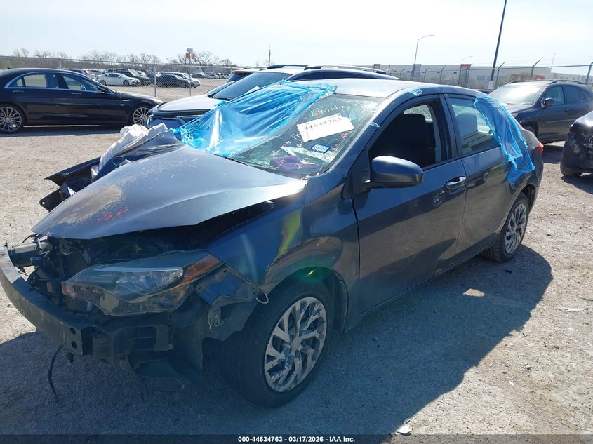 2017 Toyota Corolla VIN 5YFBURHE2HP699540 IAAI salvage auction — ALL OVER, Salvage Title, sold $1,000 on 2026-07-14 (photo 2)
