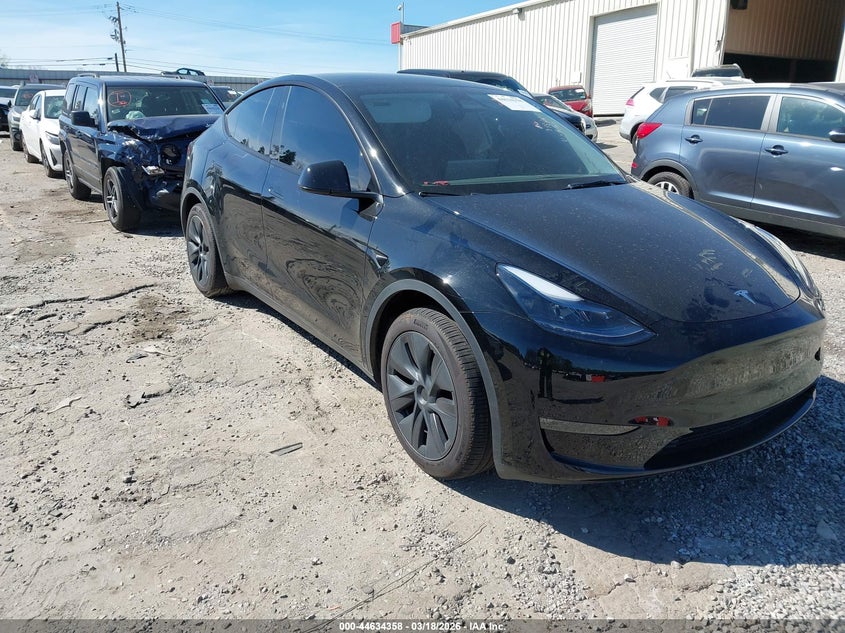 2024 Tesla Model y VIN 7SAYGDEE1RA325913 IAAI salvage auction — LEFT SIDE, Salvage Title, sold $14,000 on 2026-07-23 (photo 1)
