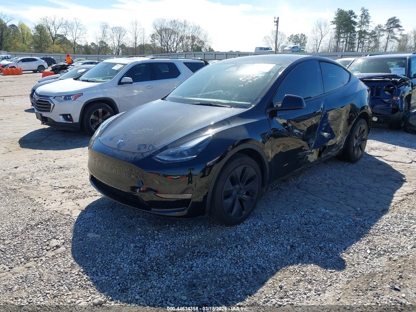 2024 Tesla Model y VIN 7SAYGDEE1RA325913 IAAI salvage auction — LEFT SIDE, Salvage Title, sold $14,000 on 2026-07-23 (photo 2)