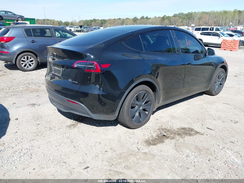 2024 Tesla Model y VIN 7SAYGDEE1RA325913 IAAI salvage auction — LEFT SIDE, Salvage Title, sold $14,000 on 2026-07-23 (photo 4)