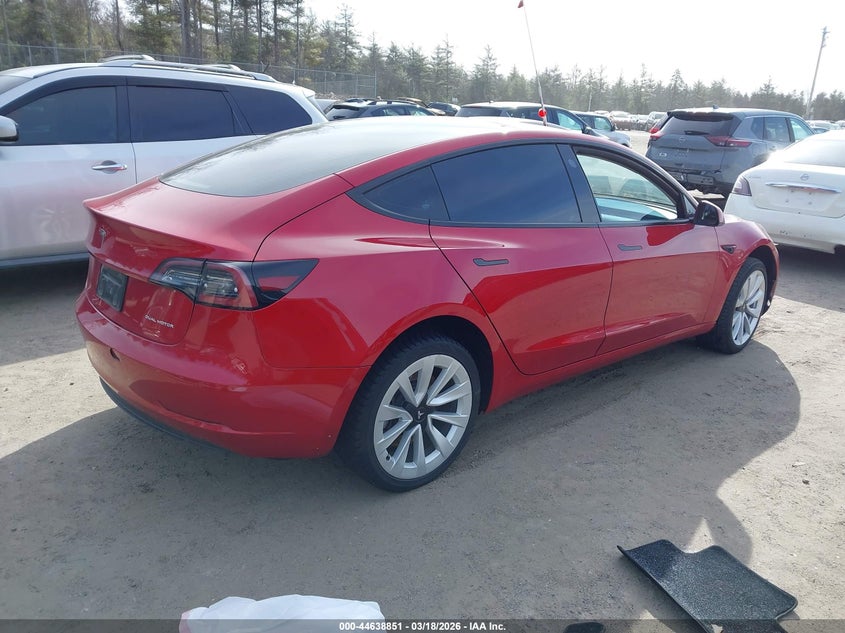 2021 Tesla Model 3 VIN 5YJ3E1EBXMF013165 IAAI salvage auction — UNDERCARRIAGE, Salvage Title, sold $5,700 on 2026-07-23 (photo 4)