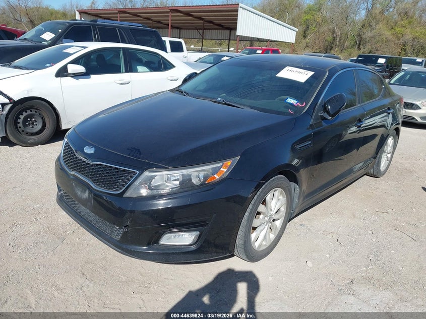 2015 Kia Optima VIN 5XXGN4A79FG351824 IAAI salvage auction — NORMAL WEAR, Original (Texas), sold $25 on 2026-07-29 (photo 2)