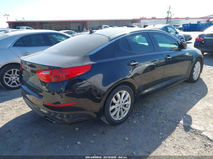 2015 Kia Optima VIN 5XXGN4A79FG351824 IAAI salvage auction — NORMAL WEAR, Original (Texas), sold $25 on 2026-07-29 (photo 4)