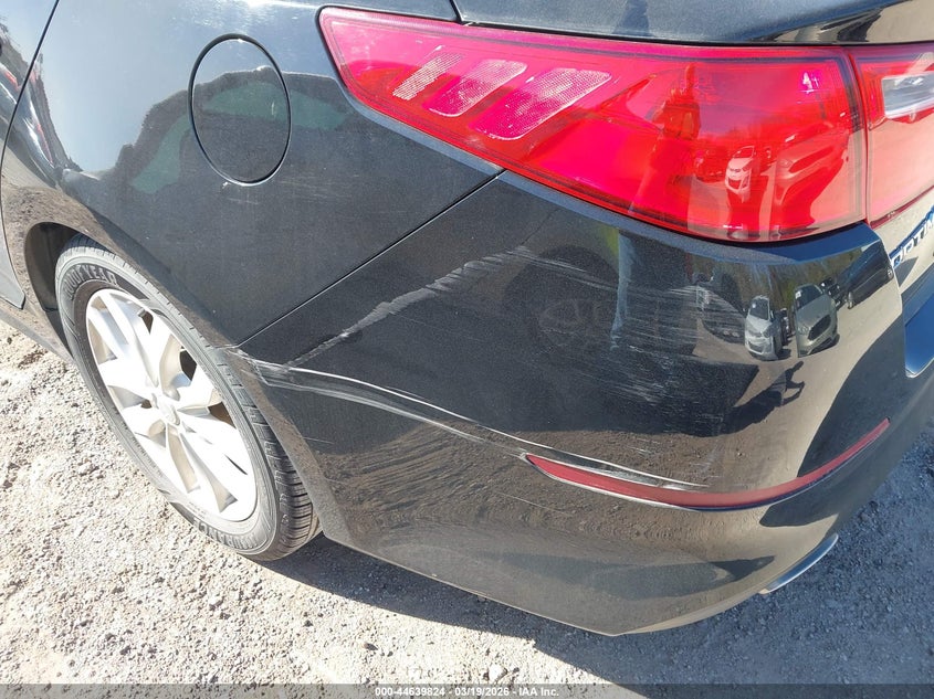 2015 Kia Optima VIN 5XXGN4A79FG351824 IAAI salvage auction — NORMAL WEAR, Original (Texas), sold $25 on 2026-07-29 (photo 6)
