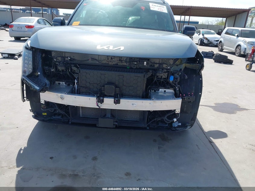 2025 Kia Ev9 VIN KNDAEFS55S6056419 IAAI salvage auction — FRONT & REAR, Original (Texas), sold $19,950 on 2026-08-27 (photo 6)