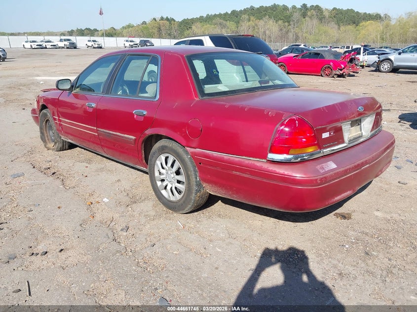 2000 Ford Crown victoria VIN 2FAFP73W2YX105897 IAAI salvage auction — FRONT & REAR, Salvage (Mississippi), sold $175 on 2026-07-08 (photo 3)