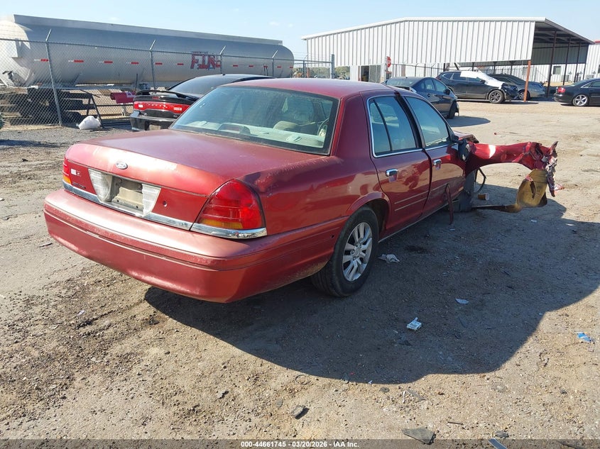 2000 Ford Crown victoria VIN 2FAFP73W2YX105897 IAAI salvage auction — FRONT & REAR, Salvage (Mississippi), sold $175 on 2026-07-08 (photo 4)