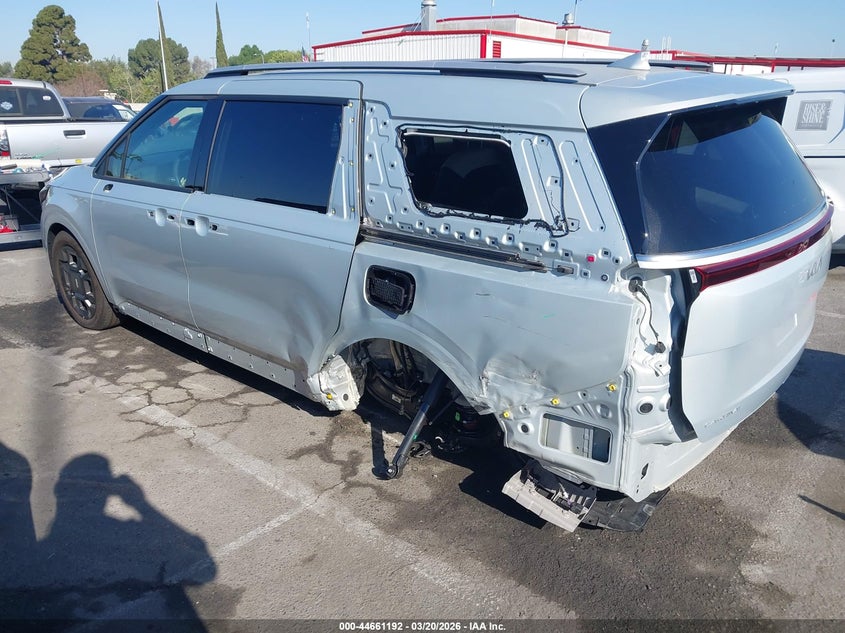 2026 Kia Carnival VIN KNDNE5KAXT6124367 IAAI salvage auction — REAR END, Salvage Title, sold $16,500 on 2026-07-23 (photo 3)