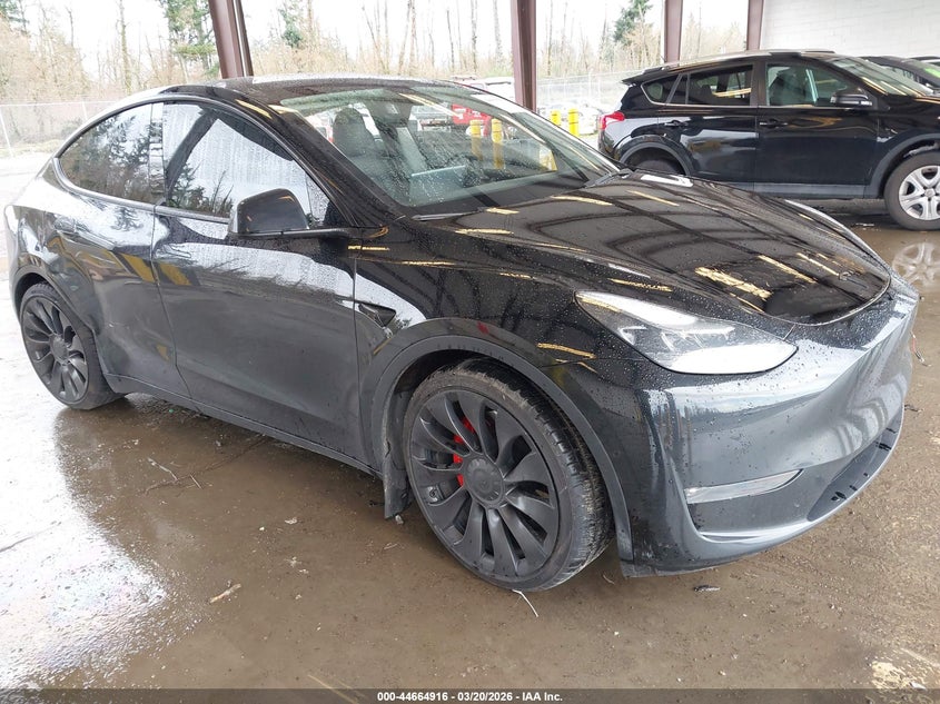 2022 Tesla Model y VIN 7SAYGDEFXNF398655 IAAI salvage auction — RIGHT REAR, Bill Of Sale (Washington), sold $9,450 on 2026-07-16 (photo 1)
