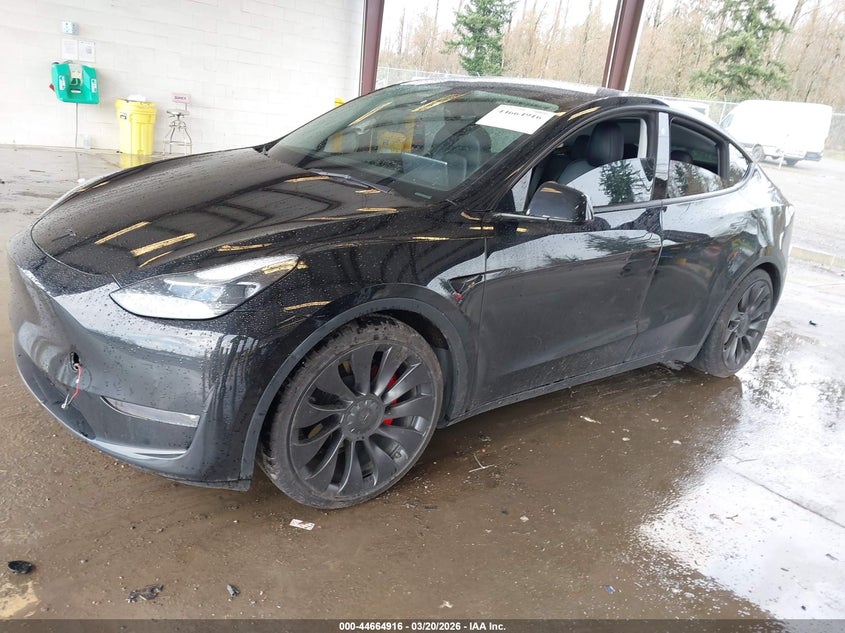 2022 Tesla Model y VIN 7SAYGDEFXNF398655 IAAI salvage auction — RIGHT REAR, Bill Of Sale (Washington), sold $9,450 on 2026-07-16 (photo 2)