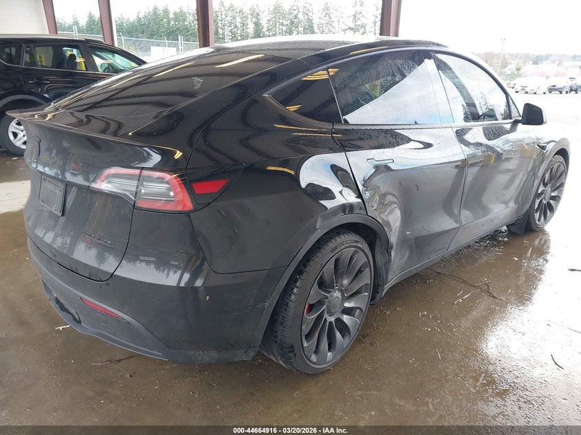 2022 Tesla Model y VIN 7SAYGDEFXNF398655 IAAI salvage auction — RIGHT REAR, Bill Of Sale (Washington), sold $9,450 on 2026-07-16 (photo 4)