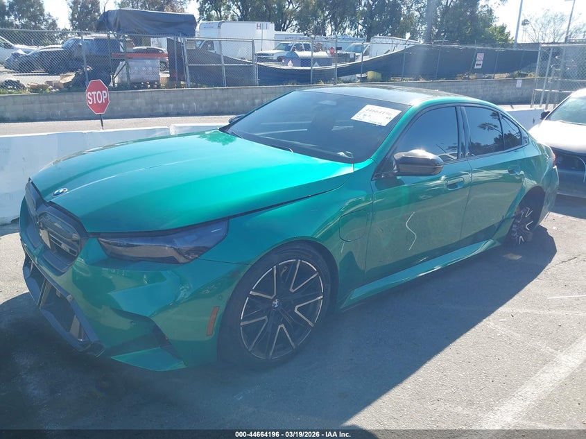 2026 BMW M5 VIN WBS83FK07TCV57980 IAAI salvage auction — LEFT & RIGHT, Salvage Title, sold $30,250 on 2026-07-27 (photo 2)